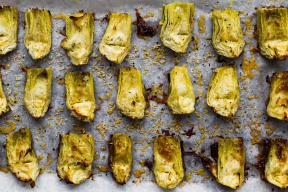 artichoke with cheese on tray