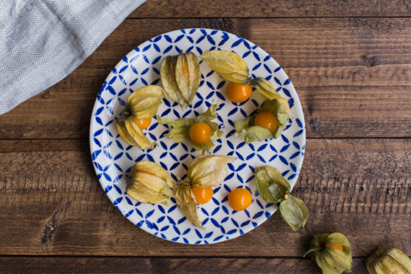 physalis fruit on plate on rustic table